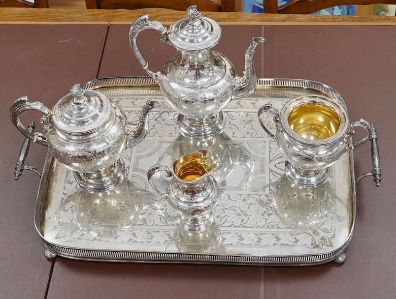 A Victorian four piece plated teaset and a tray. CITES Submission reference 6R2FT6J1. Condition - good